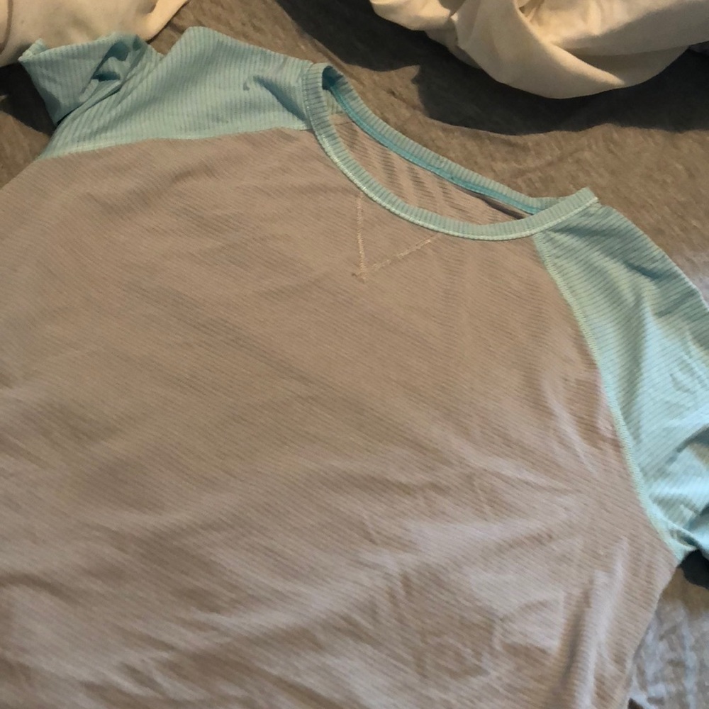 grey and light blue ivivva shirt